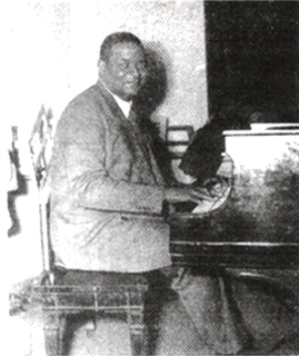Richard M. Jones at the piano