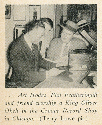 Featheringill et al. inspecting a King Oliver OKeh at the Groove Record Shop