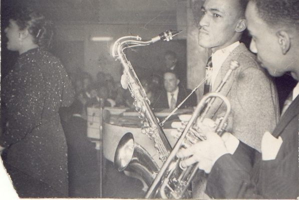 Claude McLin backs Billie Holiday at the Pershing Ballroom
